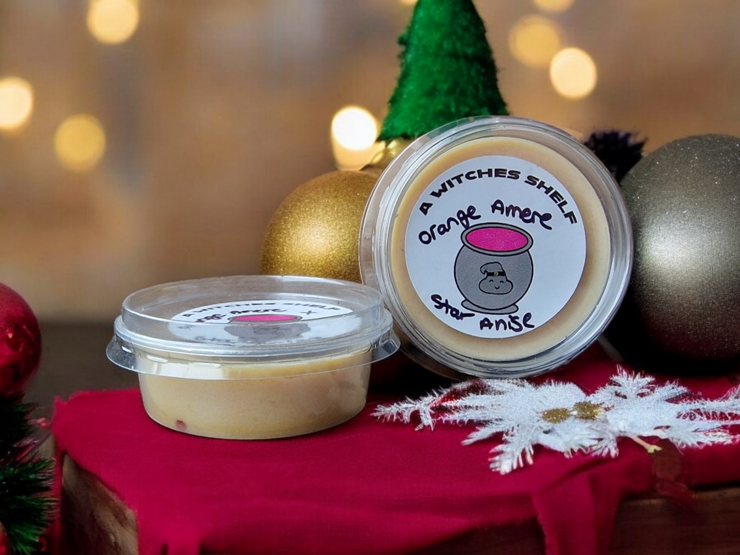 100 percent eco soy 2oz pot wax melt in the scent Orange Amere and star anise.